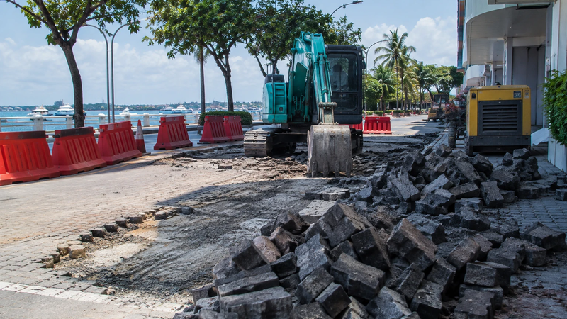 MTCC removes paving stones for roadworks on the closed IGMH-side lane of Boduthakurufaanu Magu near Rasfannu.