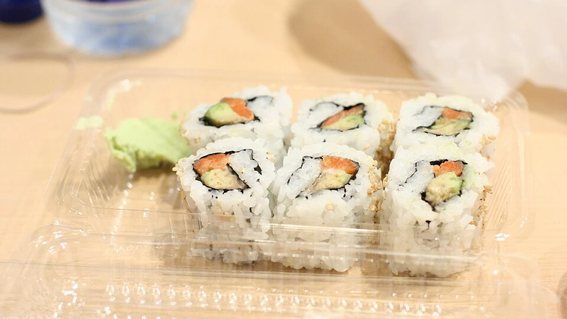 A tuna roll cut into pieces.